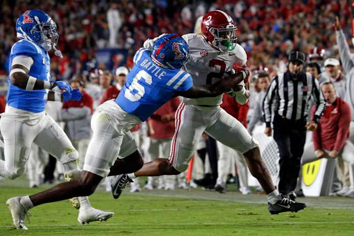 Nov 12, 2022; Oxford, Mississippi, USA; Alabama Crimson Tide running back Jase McClellan (2) runs the ball as Mississippi Rebels defensive back Miles Battle (6) attempts to make the tackle during the second half at Vaught-Hemingway Stadium.